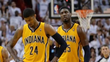 May 30, 2014; Miami, FL, USA; Indiana Pacers forward Paul George (24) and center Roy Hibbert (55) react during the second half in game six of the Eastern Conference Finals of the 2014 NBA Playoffs against the Miami Heat at American Airlines Arena. Mandatory Credit: Steve Mitchell-USA TODAY Sports