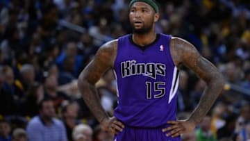April 4, 2014; Oakland, CA, USA; Sacramento Kings center DeMarcus Cousins (15) looks on against the Golden State Warriors during the third quarter at Oracle Arena. The Warriors defeated the Kings 102-69. Mandatory Credit: Kyle Terada-USA TODAY Sports