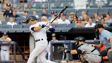 Sep 2, 2013; Bronx, NY, USA; New York Yankees shortstop Derek Jeter (2) hits an RBI single during the first inning against the Chicago White Sox at Yankee Stadium. Mandatory Credit: Anthony Gruppuso-USA TODAY Sports
