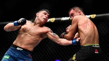 MELBOURNE, AUSTRALIA - FEBRUARY 10: Ricky Simon of the United States punches Rani Yahya of Brazil during their Bantamweight bout during UFC234 at Rod Laver Arena on February 10, 2019 in Melbourne, Australia. (Photo by Quinn Rooney/Getty Images)
