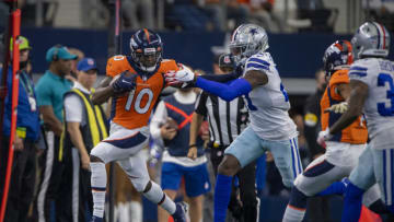Nov 7, 2021; Arlington, Texas, USA; Denver Broncos wide receiver Jerry Jeudy (10) catches a pass for a first down against the Dallas Cowboys during the second half at AT&T Stadium. Mandatory Credit: Jerome Miron-USA TODAY Sports