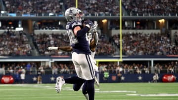 ARLINGTON, TEXAS - DECEMBER 15: Jason Witten #82 of the Dallas Cowboys makes a touchdown pass reception against Marqui Christian #26 of the Los Angeles Rams in the first quarter at AT&T Stadium on December 15, 2019 in Arlington, Texas. (Photo by Ronald Martinez/Getty Images)