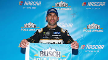 HAMPTON, GA - FEBRUARY 22: Aric Almirola, driver of the #10 Smithfield Ford, poses for a photo after winning the pole award during qualifying for the Monster Energy NASCAR Cup Series Folds of Honor Quiktrip 500 at Atlanta Motor Speedway on February 22, 2019 in Hampton, Georgia. (Photo by Sean Gardner/Getty Images)