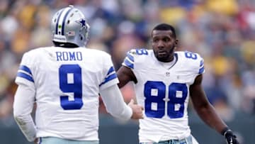 GREEN BAY, WI - JANUARY 11: Tony Romo #9 and Dez Bryant #88 of the Dallas Cowboys wait for an officials' review during the 2015 NFC Divisional Playoff game at Lambeau Field on January 11, 2015 in Green Bay, Wisconsin. (Photo by Mike McGinnis/Getty Images)