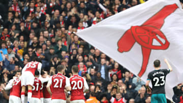 LONDON, ENGLAND - APRIL 08: Pierre-Emerick Aubameyang of Arsenal celebrates with team mates after scoring his sides first goal during the Premier League match between Arsenal and Southampton at Emirates Stadium on April 8, 2018 in London, England. (Photo by Bryn Lennon/Getty Images)