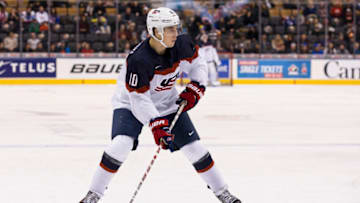 TORONTO, ON - DECEMBER 28: Forward Tanner Laczynski #10 of Team United States skates with the puck against Team Slovakia in a preliminary round - Group B game during the IIHF World Junior Championship on December 28, 2016 at the Air Canada Centre in Toronto, Canada. (Photo by Adam Pulicicchio/Getty Images)