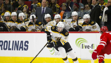 Feb 26, 2016; Raleigh, NC, USA; Boston Bruins forward Ryan Spooner (51) skates with the puck against the Carolina Hurricanes at PNC Arena. The Boston Bruins defeated the Carolina Hurricanes 4-1. Mandatory Credit: James Guillory-USA TODAY Sports