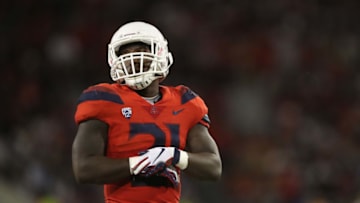 TUCSON, AZ - SEPTEMBER 01: Running back J.J. Taylor #21 of the Arizona Wildcats during the college football game against the Brigham Young Cougars at Arizona Stadium on September 1, 2018 in Tucson, Arizona. The Cougars defeated the Wildcats 28-23. (Photo by Christian Petersen/Getty Images)