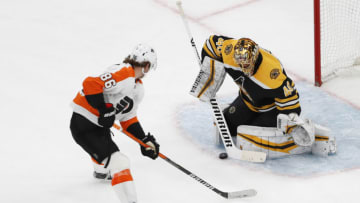 Jan 13, 2022; Boston, Massachusetts, USA; Boston Bruins goaltender Tuukka Rask (40) stops Philadelphia Flyers left wing Joel Farabee (86) on a breakaway during the second period at TD Garden. Mandatory Credit: Winslow Townson-USA TODAY Sports