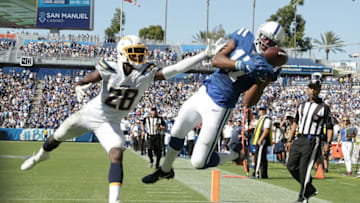 CARSON, CALIFORNIA - SEPTEMBER 08: Devin Funchess #17 of the Indianapolis Colts can't come down with the catch while pursued by Brandon Facyson #28 of the Los Angeles Chargers in the fourth quarter at Dignity Health Sports Park on September 08, 2019 in Carson, California. The Chargers defeated the Colts 30-24 in overtime. (Photo by Jeff Gross/Getty Images)
