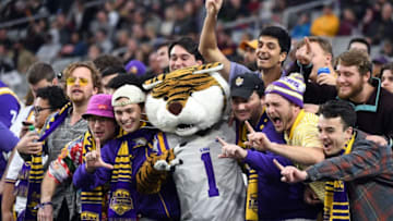 GLENDALE, ARIZONA - JANUARY 01: LSU Tigers fans cheer with mascot Mike the Tiger during the first half of the PlayStation Fiesta Bowl between LSU and Central Florida at State Farm Stadium on January 01, 2019 in Glendale, Arizona. (Photo by Norm Hall/Getty Images)