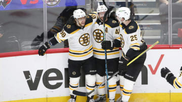 May 23, 2021; Washington, District of Columbia, USA; Boston Bruins right wing David Pastrnak (88) celebrates with teammates after scoring a goal against the Washington Capitals during the second period in game five of the first round of the 2021 Stanley Cup Playoffs at Capital One Arena. Mandatory Credit: Amber Searls-USA TODAY Sports
