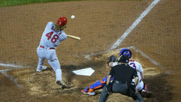 Sep 13, 2021; New York City, New York, USA; St. Louis Cardinals center fielder Harrison Bader (48) hits and RBI single against the New York Mets during the ninth inning at Citi Field. Mandatory Credit: Gregory Fisher-USA TODAY Sports