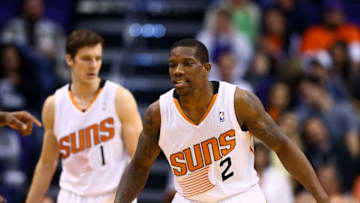Dec 13, 2013; Phoenix, AZ, USA; Phoenix Suns guard Eric Bledsoe (2) and Goran Dragic against the Sacramento Kings at US Airways Center. The Suns defeated the Kings 116-107. Mandatory Credit: Mark J. Rebilas-USA TODAY Sports