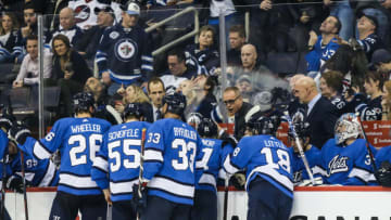 WINNIPEG, MB December 07: Coach Paul Maurice talks to his players during the regular season game between the Winnipeg Jets and the St. Louis Blues on December 07, 2018, at the Bell MTS Place in Winnipeg, MB. (Photo by Terrence Lee/Icon Sportswire via Getty Images)