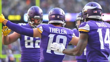 29th October 2017, Twickenham, London, England; NFL International Series, game 4, Minnesota Vikings versus Cleveland Browns; Adam Thielen of the Minnesota Vikings is congratulated by his team after scoring the Vikings first touchdown (Photo by Simon West/Action Plus via Getty Images)
