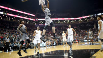 NEW YORK, NEW YORK - April 14: Mitchell Robinson #24 W. Kentucky dunks during the Jordan Brand Classic, National Boys Team All-Star basketball game at The Barclays Center on April 14, 2017 in New York City. (Photo by Tim Clayton/Corbis via Getty Images)
