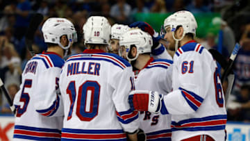 TAMPA, FL - MAY 26: Rick Nash #61 of the New York Rangers celebrates with teammate J.T. Miller #10 after scoring a goal against Andrei Vasilevskiy #88 of the Tampa Bay Lightning during the third period in Game Six of the Eastern Conference Finals during the 2015 NHL Stanley Cup Playoffs at Amalie Arena on May 26, 2015 in Tampa, Florida. (Photo by Mike Carlson/Getty Images)