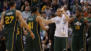 Mar 17, 2016; Salt Lake City, UT, USA; Utah Jazz forward Joe Ingles (2) and forward Derrick Favors (15) wait for center Rudy Gobert (27) and forward Trey Lyles (41) during a timeout at Vivint Smart Home Arena. The Utah Jazz defeated the Phoenix Suns 103-69. Mandatory Credit: Jeff Swinger-USA TODAY Sports