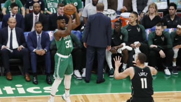 Dec 21, 2018; Boston, MA, USA; Boston Celtics forward Semi Ojeleye (37) shoot for three points against Milwaukee Bucks center Brook Lopez (11) in the first quarter at TD Garden. Mandatory Credit: David Butler II-USA TODAY Sports
