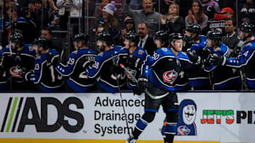Dec 9, 2022; Columbus, Ohio, USA; Columbus Blue Jackets left wing Eric Robinson (50) celebrates with teammates after scoring a goal against the Calgary Flames in the second period at Nationwide Arena. Mandatory Credit: Aaron Doster-USA TODAY Sports