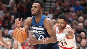 PORTLAND, OREGON - DECEMBER 21: Andrew Wiggins #22 of the Minnesota Timberwolves works towards the basket against Kent Bazemore #24 of the Portland Trail Blazers in the fourth quarter during their game at Moda Center on December 21, 2019 in Portland, Oregon. NOTE TO USER: User expressly acknowledges and agrees that, by downloading and or using this photograph, User is consenting to the terms and conditions of the Getty Images License Agreement (Photo by Abbie Parr/Getty Images) (Photo by Abbie Parr/Getty Images)