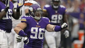 Sep 22, 2013; Minneapolis, MN, USA; Minnesota Vikings defensive end Brian Robison (96) celebrates a sack during the fourth quarter against the Cleveland Browns at Mall of America Field at H.H.H. Metrodome. The Browns defeated the Vikings 31-27. Mandatory Credit: Brace Hemmelgarn-USA TODAY Sports