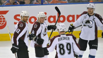 Mar 20, 2016; Edmonton, Alberta, CAN; Colorado Avalanche right winger Jarome Iginla (12) celebrates with Avalanche defenseman Tyson Barrie (4) with Avalanche left winger Mikkel Boedker (89) and Avalanche left winger Gabriel Landeskog (92) as they took on the Edmonton Oilers during the second period at Rexall Place. Mandatory Credit: Walter Tychnowicz-USA TODAY Sports