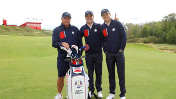 KOHLER, WISCONSIN - SEPTEMBER 22: Justin Thomas of team United States (C) poses for photos with his caddie Jimmy Johnson (L) and Jordan Spieth of team United States during a practice round prior to the 43rd Ryder Cup at Whistling Straits on September 22, 2021 in Kohler, Wisconsin. (Photo by Andrew Redington/Getty Images)