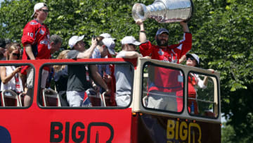 WASHINGTON, DC - JUNE 12: Alex Ovechkin of the NHL champions Washington Capitals holds up the Stanley Cup during a victory parade along Contitution Avenue June 12, 2018, in Washington, DC. (Photo by Alex Brandon-Pool/Getty Images)