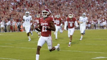 Oct 29, 2016; Norman, OK, USA; Oklahoma Sooners wide receiver Dede Westbrook (11) returns a punt for a touchdown against the Kansas Jayhawks during the first quarter at Gaylord Family - Oklahoma Memorial Stadium. Mandatory Credit: Mark D. Smith-USA TODAY Sports