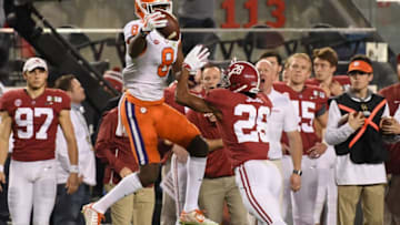 SANTA CLARA, CA - JANUARY 07: Justyn Ross #8 of the Clemson Tigers makes a catch against Josh Jobe #28 of the Alabama Crimson Tide during the third quarter in the CFP National Championship presented by AT&T at Levi's Stadium on January 7, 2019 in Santa Clara, California. (Photo by Harry How/Getty Images)
