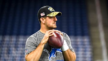 DETROIT, MICHIGAN - OCTOBER 31: David Blough #10 of the Detroit Lions warms up before the game against the Philadelphia Eagles at Ford Field on October 31, 2021 in Detroit, Michigan. (Photo by Nic Antaya/Getty Images)