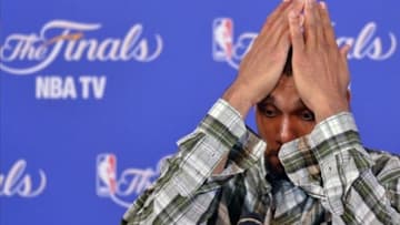 Jun 18, 2013; Miami, FL, USA; San Antonio Spurs power forward Tim Duncan reacts during the post-game press conference after game six in the 2013 NBA Finals at American Airlines Arena. Miami defeated San Antonio 103-100. Mandatory Credit: Steve Mitchell-USA TODAY Sports