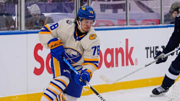 Mar 13, 2022; Hamilton, Ontario, CAN; Buffalo Sabres defenseman Jacob Bryson (78) carries the puck against the Toronto Maple Leafs in the 2022 Heritage Classic ice hockey game at Tim Hortons Field. Mandatory Credit: John E. Sokolowski-USA TODAY Sports