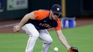 HOUSTON, TEXAS - AUGUST 24: Alex Bregman #2 of the Houston Astros takes infield practice before a game with the Kansas City Royals at Minute Maid Park on August 24, 2021 in Houston, Texas. Bregman is on the injured list rehabbing is hamstring. (Photo by Bob Levey/Getty Images)