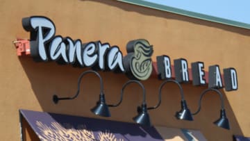 HUNTINGTON STATION, NEW YORK - MARCH 26: A Panera Bread sign is seen at the Walt Whitman Mall on March 26, 2020 in Huntington Station, New York. Across the country schools, businesses and places of work have either been shut down or are restricting hours of operation as health officials try to slow the spread of COVID-19. (Photo by Bruce Bennett/Getty Images)