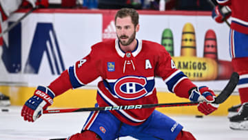 MONTREAL, CANADA - MARCH 07: Joel Edmundson #44 of the Montreal Canadiens goes through his warm-up routine prior to the game against the Carolina Hurricanes at Centre Bell on March 7, 2023 in Montreal, Quebec, Canada. The Carolina Hurricanes defeated the Montreal Canadiens 4-3 in a shootout. (Photo by Minas Panagiotakis/Getty Images)