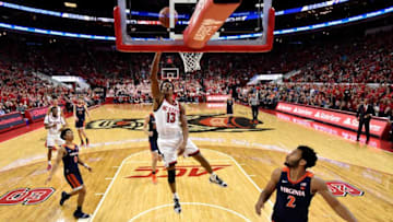 RALEIGH, NC - JANUARY 29: C.J. Bryce #13 of the North Carolina State Wolfpack puts up a shot against the Virginia Cavaliers in the second half at PNC Arena on January 29, 2019 in Raleigh, North Carolina. (Photo by Lance King/Getty Images)