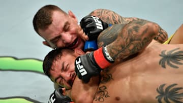 LOS ANGELES, CA - AUGUST 04: (L-R) Renato Moicano of Brazil secures a rear choke submission against Cub Swanson in their featherweight fight during the UFC 227 event inside Staples Center on August 4, 2018 in Los Angeles, California. (Photo by Jeff Bottari/Zuffa LLC/Zuffa LLC via Getty Images)