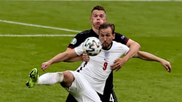 Harry Kane (9) of England in action against Matthias Ginter (4) of Germany. (Photo by Ali Balikci/Anadolu Agency via Getty Images)