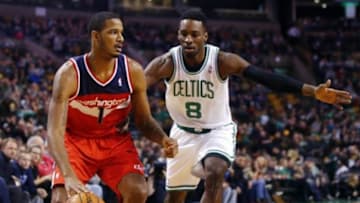 Dec 21, 2013; Boston, MA, USA; Washington Wizards small forward Trevor Ariza (1) drives the ball against Boston Celtics shooting guard Jeff Green (8) during the first half at TD Garden. The Washington Wizards defeated the Celtics 106-99. Mandatory Credit: David Butler II-USA TODAY Sports