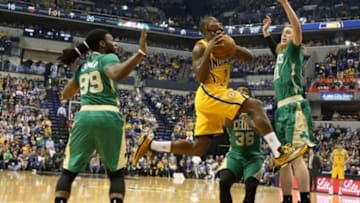 Mar 14, 2015; Indianapolis, IN, USA; Indiana Pacers guard Rodney Stuckey (2) takes a shot against Boston Celtics center Kelly Olynyk (41) at Bankers Life Fieldhouse. Mandatory Credit: Brian Spurlock-USA TODAY Sports
