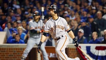 Oct 7, 2016; Chicago, IL, USA; San Francisco Giants left fielder Angel Pagan (16) hits a double against the Chicago Cubs during the fourth inning during game one of the 2016 NLDS playoff baseball series at Wrigley Field. Mandatory Credit: Jerry Lai-USA TODAY Sports
