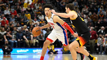 Cade Cunningham #2 of the Detroit Pistons drives into Bojan Bogdanovic #44 of the Utah Jazz (Photo by Alex Goodlett/Getty Images)