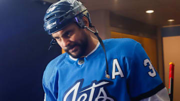 WINNIPEG, MB - DECEMBER 11: Dustin Byfuglien #33 of the Winnipeg Jets heads to the ice prior to puck drop against the Chicago Blackhawks at the Bell MTS Place on December 11, 2018 in Winnipeg, Manitoba, Canada. (Photo by Darcy Finley/NHLI via Getty Images)