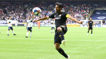 VANCOUVER, BC - APRIL 17: Los Angeles FC forward Carlos Vela (10) jumps for the ball during their match against the Vancouver Whitecaps at BC Place on April 17, 2019 in Vancouver, Canada. Vancouver won the match 1-0. (Photo by Devin Manky/Icon Sportswire via Getty Images)