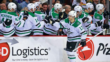 VANCOUVER, BC - MARCH 30: Andrew Cogliano #17 of the Dallas Stars is congratulated by teammates after scoring during their NHL game against the Vancouver Canucks at Rogers Arena March 30, 2019 in Vancouver, British Columbia, Canada. Vancouver won 3-2. (Photo by Jeff Vinnick/NHLI via Getty Images)