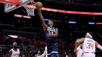 LOS ANGELES, CA - NOVEMBER 05: Jimmy Butler #23 of the Minnesota Timberwolves misses a layup behind Tobias Harris #34 and Montrezl Harrell #5 of the LA Clippers during a 120-109 Clipper win at Staples Center on November 5, 2018 in Los Angeles, California. (Photo by Harry How/Getty Images)