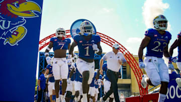 Sep 18, 2021; Lawrence, Kansas, USA; The Kansas Jayhawks take the field before the game against the Baylor Bears at David Booth Kansas Memorial Stadium. Mandatory Credit: Jay Biggerstaff-USA TODAY Sports